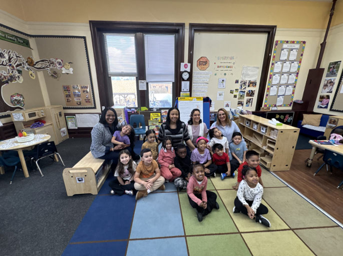 Congresswoman Hayes takes a photo with students and educators at the Meriden YMCA Head Start Program