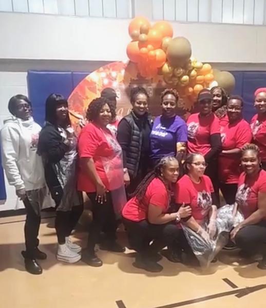 Congresswoman Hayes stands with volunteers at a local food drive
